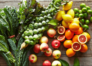 a group of fruits and vegetables on a wood surface Healthy Weight Loss Diets Maplehurst